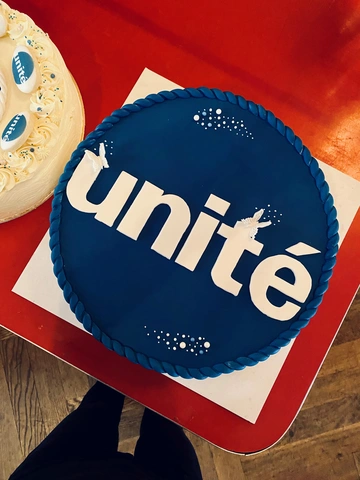 Bild der Torte mit dem Unité Logo